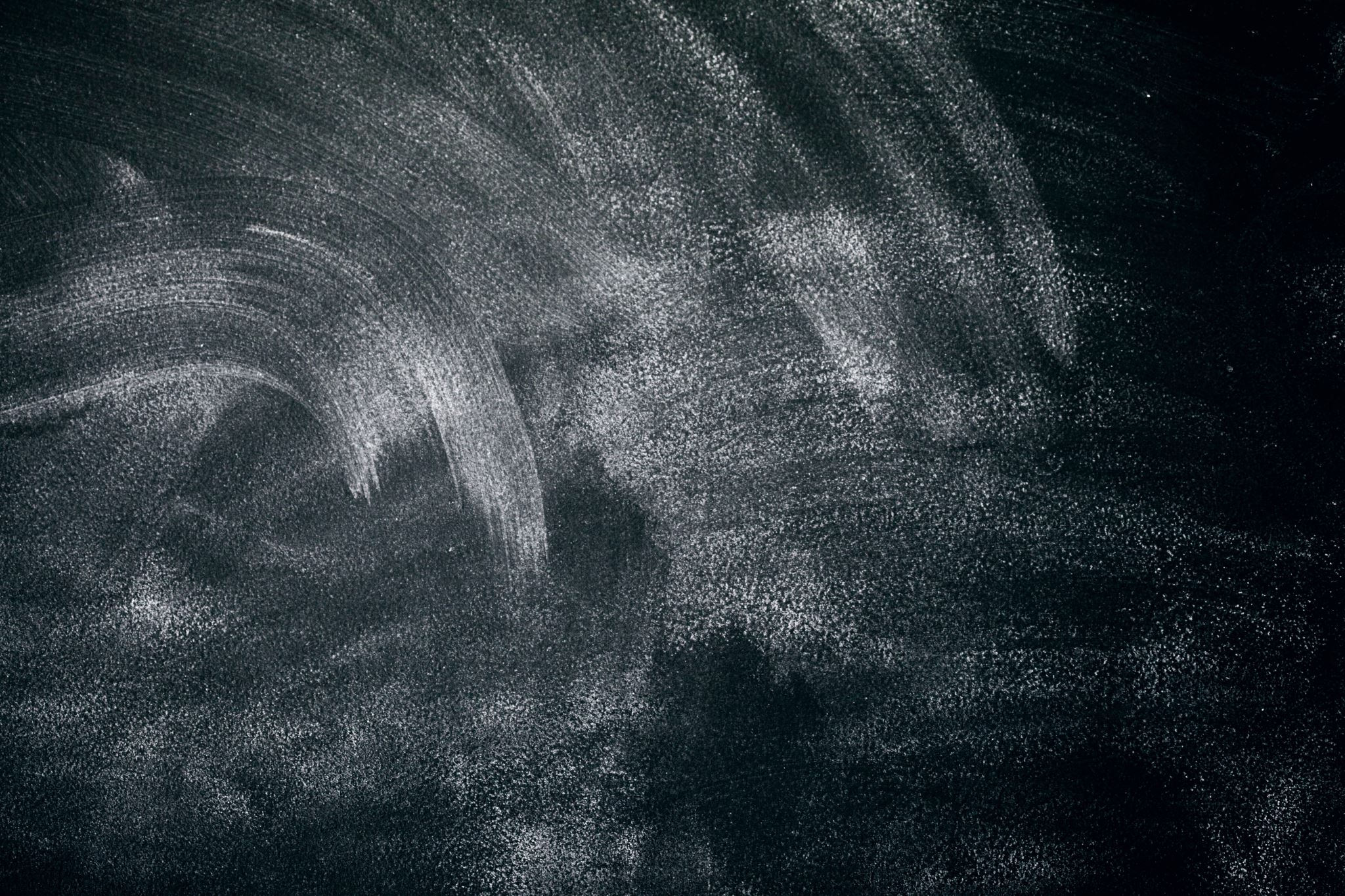 Close-up-of-blackboard-with-smudged-chalk